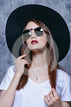 Hipster girl wearing sunglasses