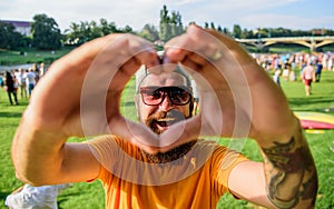 Hipster happy celebrate event picnic fest festival. Cheerful fan love summer fest. Man bearded hipster in front of crowd