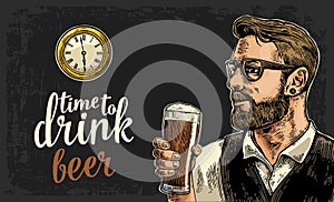 Hipster holding a glass of beer and antique pocket watch