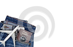 Hipster Jean pant with travel objects on white wood