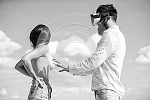 Hipster man play virtual sex game hmd or vr glasses. Virtual sexual activity. Man touch naked erotic breasts