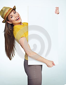 Hipster style girl holding big white sign board.