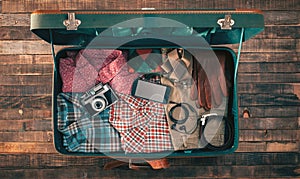 Hipster traveler packing