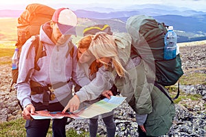 Hipster traveler on top of mountains