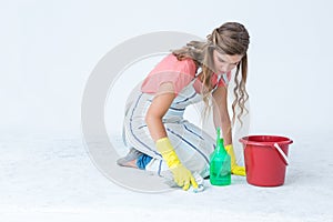 Hipster woman cleaning the ground