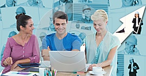 Hipsters using laptop at desk against graph