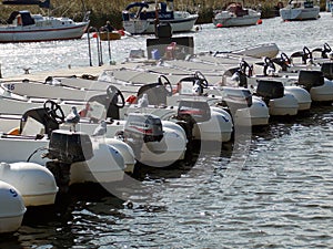 Hire boats lined up in the harbour at Christchurch