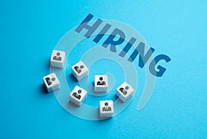 Hiring. Assemble a team of people. Recruitment seeking to fill job openings.