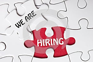 HIRING concept. Missing Piece Jigsaw Puzzle with word