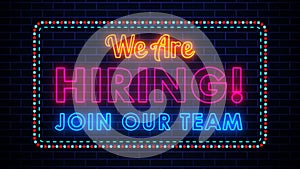 We Are Hiring Join Our Team Lettering Glowing Light Neon Sign With Motion Dotted And Dashed Border Line On Dark Blue Brick Wall