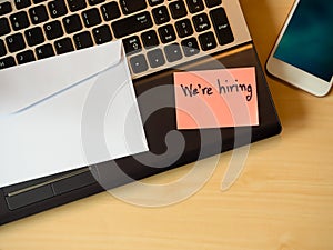 We are hiring to be message in the letter  on the table