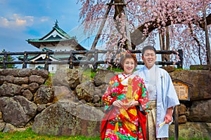 Unidentified Japanese gloom and bride at Hirosaki park