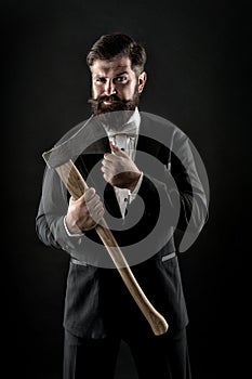 His beard needs barber. Barber prepare axe blade for shaving. Bearded man hold axe. Barber salon. Barbershop. Barber