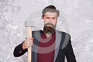 His bearded hair look styled. Bearded man shave facial hair with axe. Hair salon. Hipster with mustache and beard