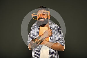 His favorite book. Bearded man in party glasses with lesson book. Book nerd wearing fancy glasses. University male