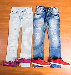 His and Hers Blue Jeans Laid with Shoes photo