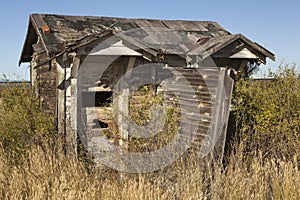 His and hers outhouse prairie grass building bathroom