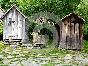 His and Hers Outhouses photo