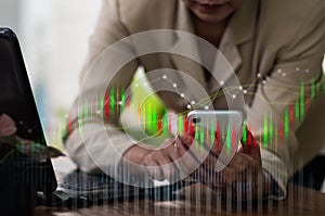 On his left hand, a woman in a suit is carrying a cell phone. His right hand is pointing to a rapidly expanding stock chart.