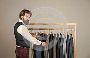 His look is great. Fashion design studio. Male fashion designer. Individual measures hand of man. Man ordering business