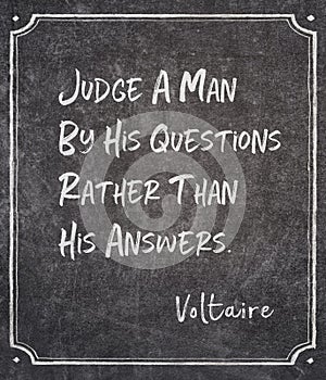 by his questions Voltaire