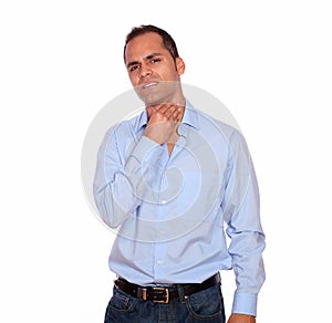 Hispanic adult man with throat pain