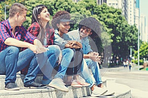 Hispanic and african american hipster young adults in the city