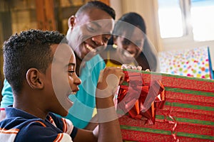 Hispanic Boy Opening Gift Box Happy Black Child Celebrating Birthday