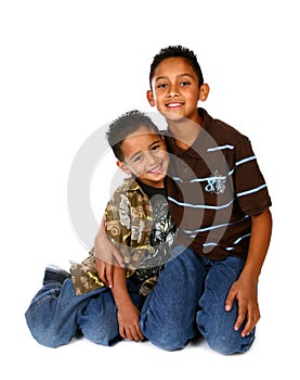 Hispanic Brothers Smiling and Hugging