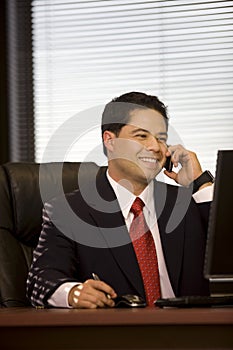 Hispanic Business Man On Cellphone