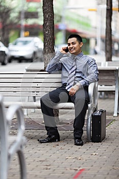 Hispanic Businessman - Chatting on cell phone