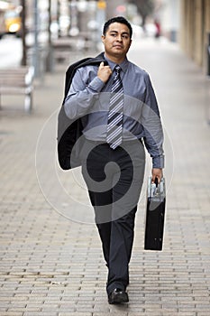 Hispanic Businessman - Walking With Briefcase