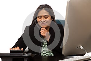 Hispanic Businesswoman Dialing A Number