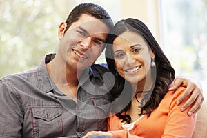 Hispanic couple at home