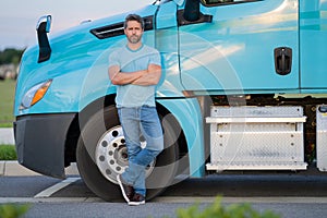 Hispanic driver near lorry truck. Man owner truck driver. Handsome hispanic man trucker trucking owner. Transportation