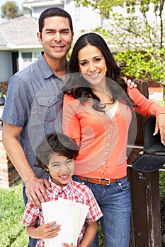 Hispanic Family Checking Mailbox