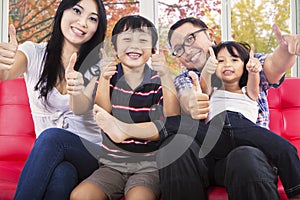 Hispanic family giving thumbs up