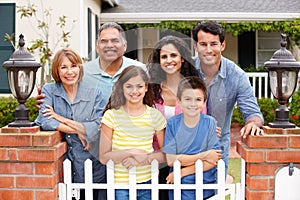 Hispanic family outside home photo