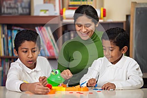 Hispanic Family Playing Mr. Frog