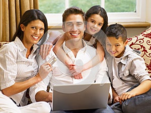 Hispanic family shopping online