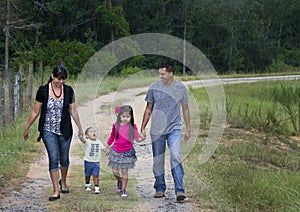 Hispanic Family - Walking in Rain