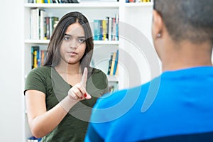 Hispanic female young adult wants distance and respect