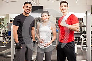 Hispanic friends ready to exercise in a gym