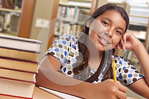 Hispanic Girl Student Studying in Library