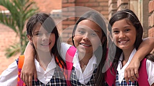 Hispanic Girl Students And Friendship Wearing School Uniforms