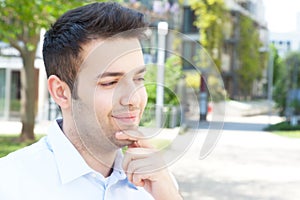 Hispanic guy in a blue shirt