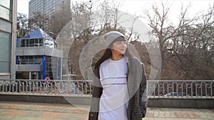 Hispanic latina fashion woman walking on a street in the City