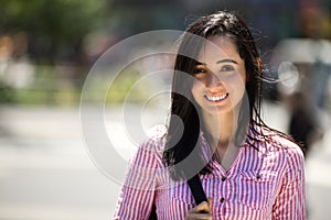 Hispanic Latina woman in city