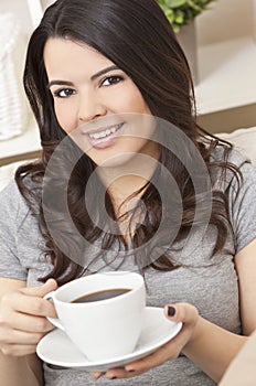 Hispanic Latina Woman Drinking Tea or Coffee