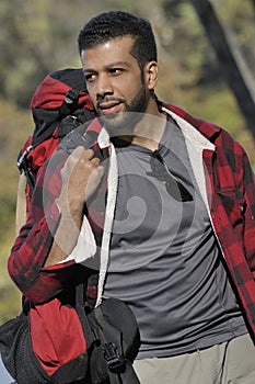 Hispanic Man Backpacking Outdoor photo